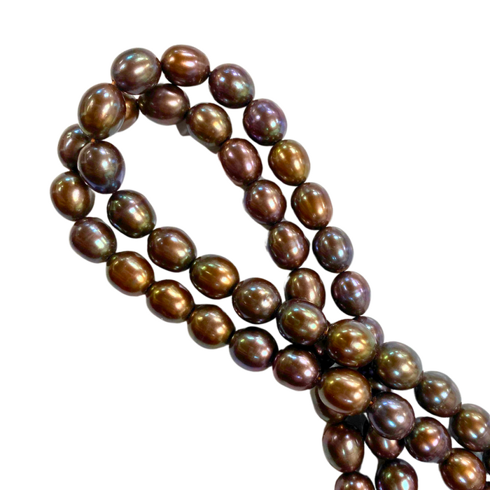 Purple Iridescent Oval Shaped Freshwater Pearls