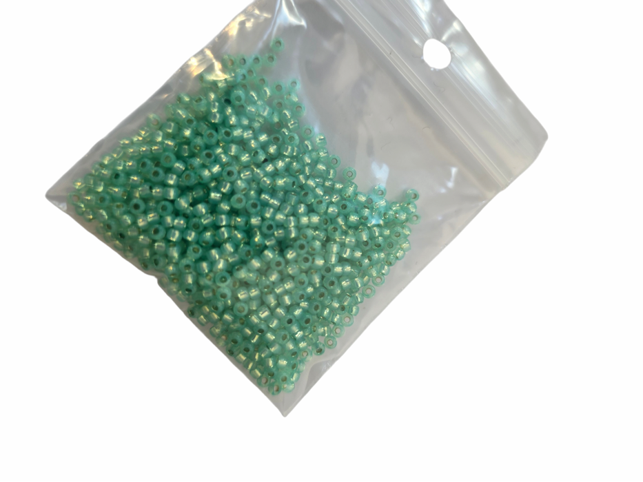 Silver lined alabaster seafoam green 11/0 10g (#24)