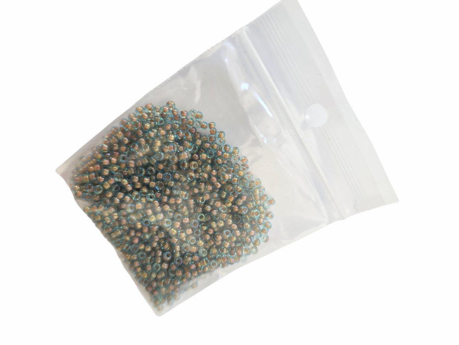 Peach lined transparent Aqua 11/0 10g (#22)