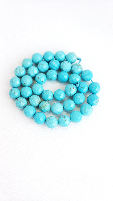 10MM TURQUOISE HOWLITE FACETED 16" STRAND