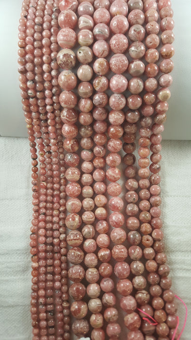 Rhodocrosite 12mm Round 16" strand Approx