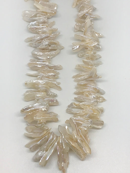 Long Cream Iridescent Freshwater Pearls